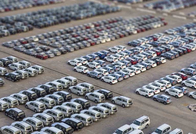 Dubai, UAE - January 03, 2017: New cars in rows stored at port-linxio